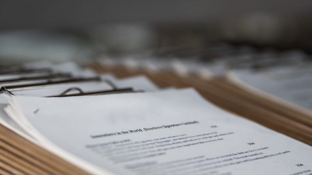restaurant menus on clipboards close up